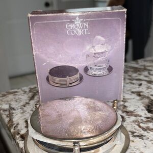 Intricate Silver Coaster Set with Holder